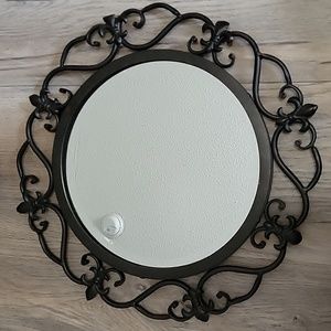 Iron wrought mirror from Hobby Lobby aprox: 13.5" with mirror being aprox: 10"